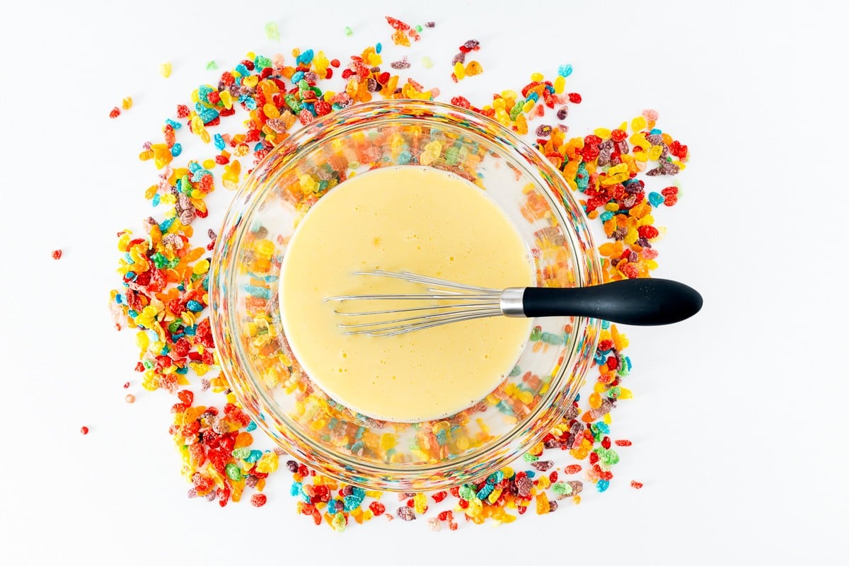 Whisking cream and eggs in a bowl