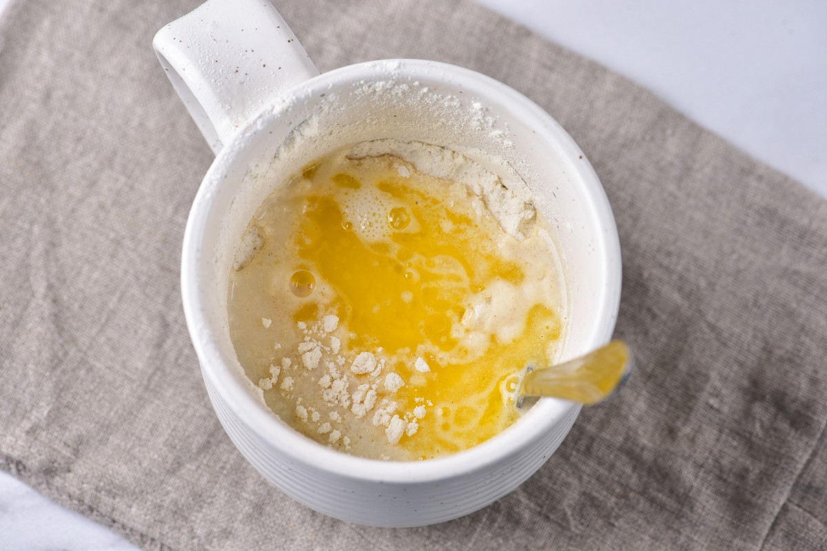 Mixing wet and dry ingredients in a mug