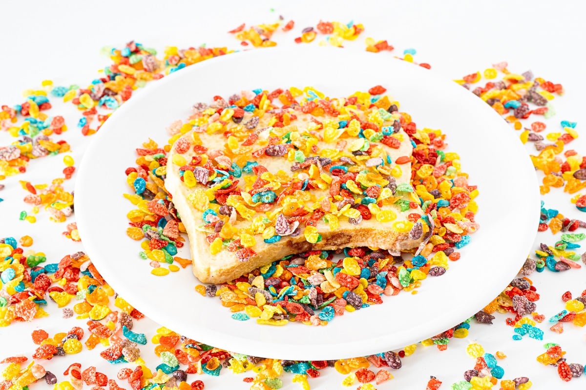 Coating toast with Fruity Pebbles