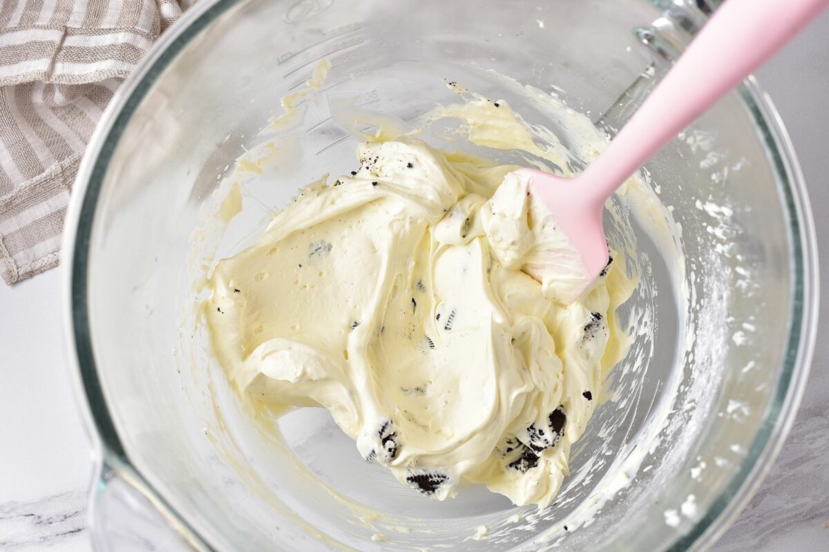 Mixing cookies and cream in a bowl