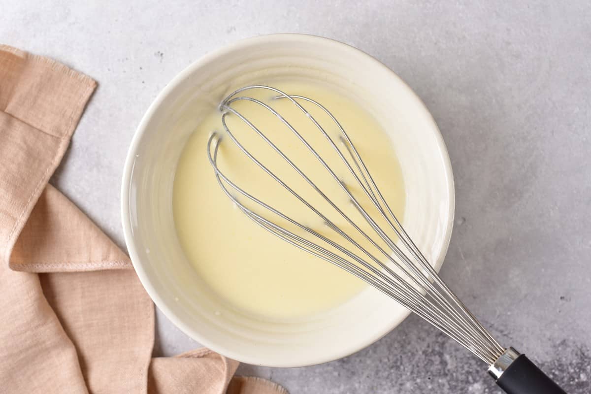 Mixing wet ingredients in a bowl