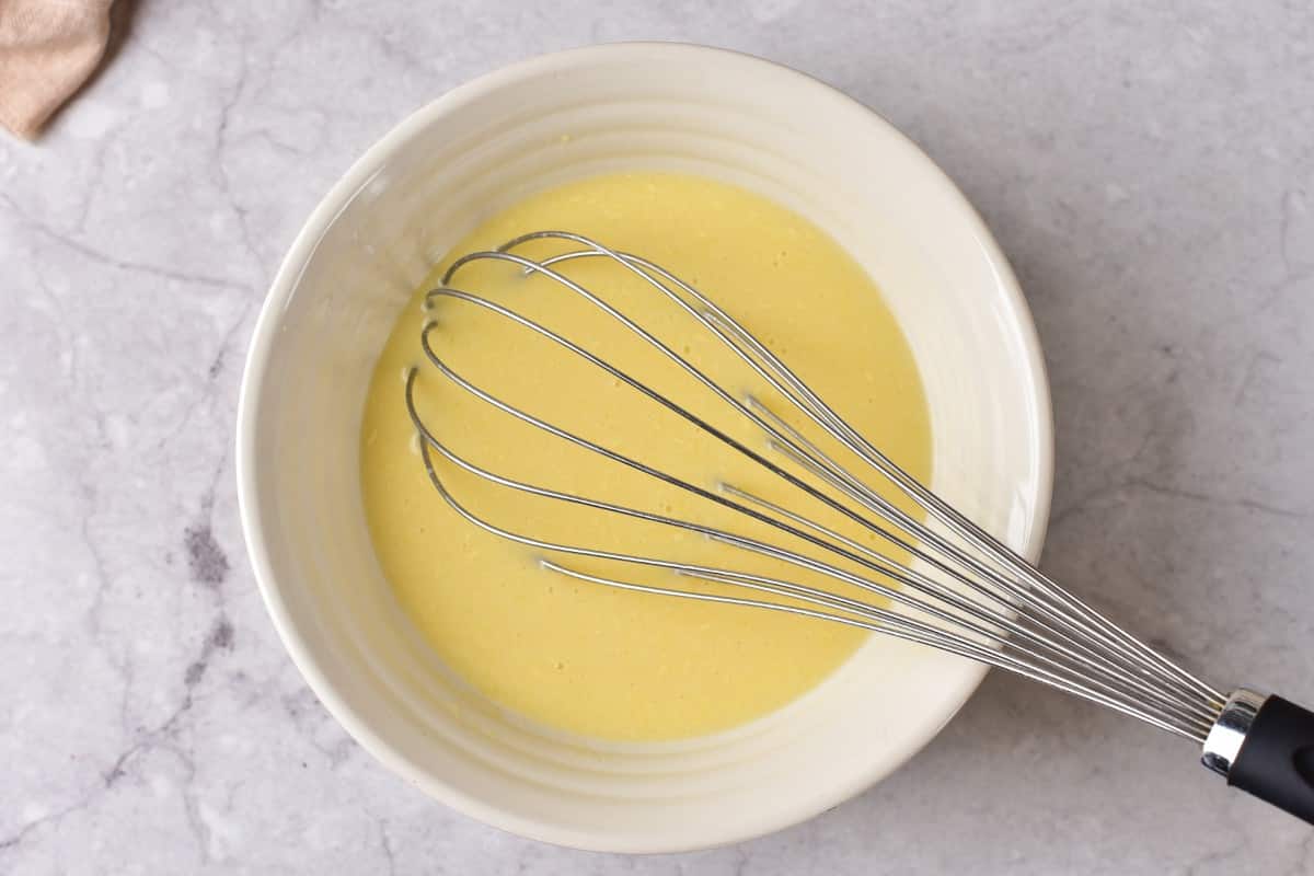 Mixing wet ingredients in a bowl