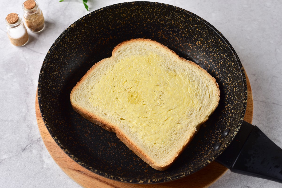 Toasting bread with butter