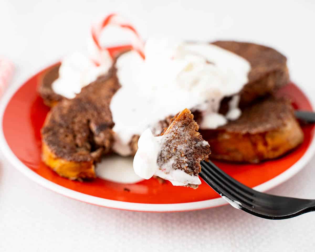 candy cane french toast topped with whipped cream