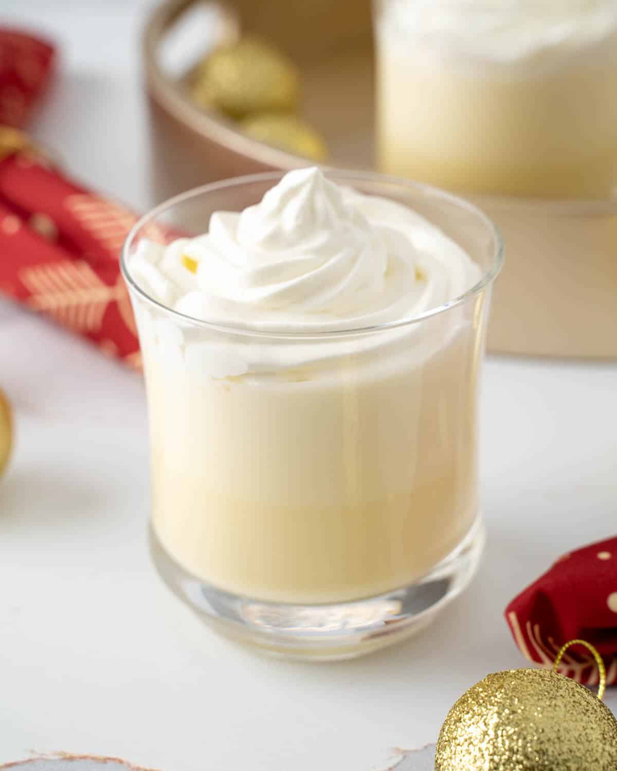 Pumpkin spice eggnog topped with whipped cream