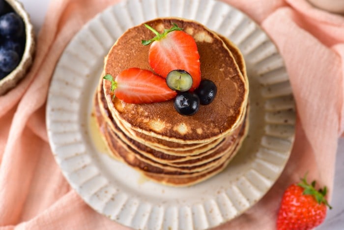 pancakes topped with fruit