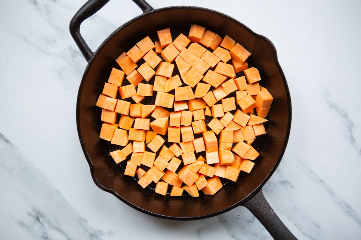 diced sweet potatoes in a skillet