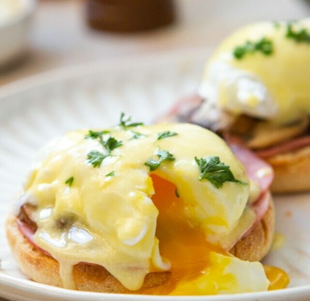 mushroom eggs benedict served on plate