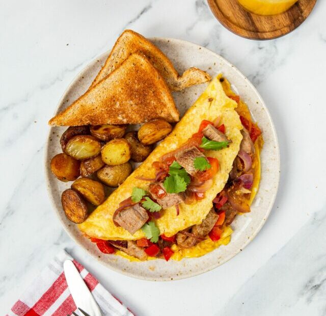 steak omelette served on plate