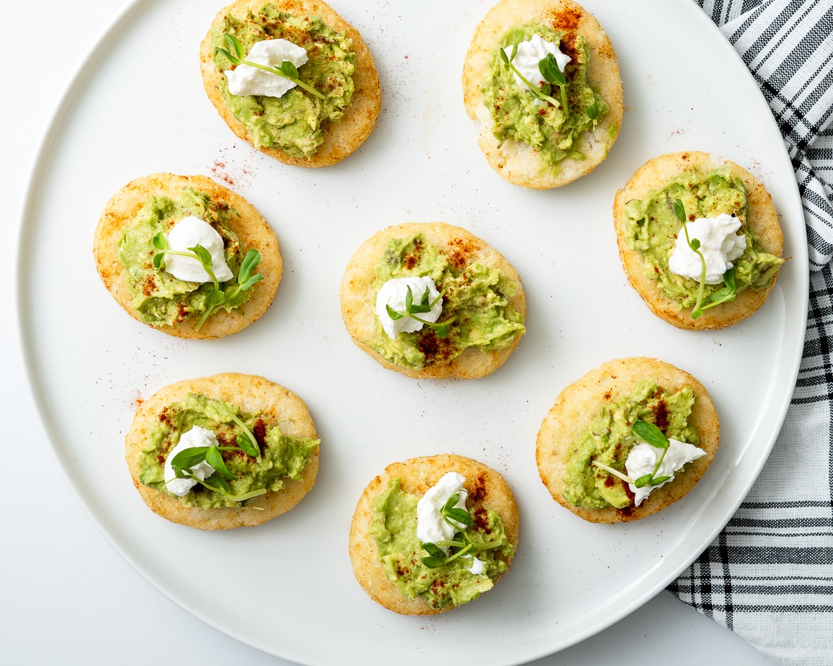 hashbrown avocado toast served on a plate