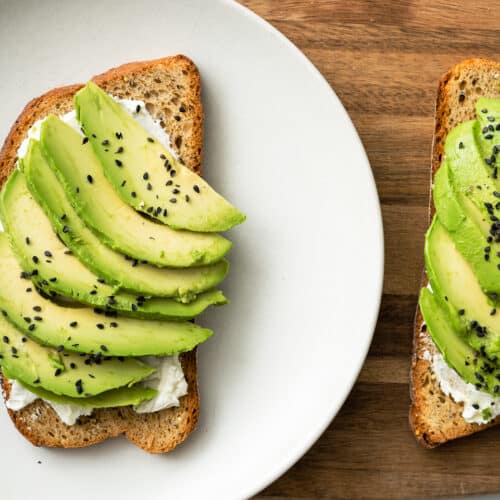 avocado cream cheese toast served on a plate