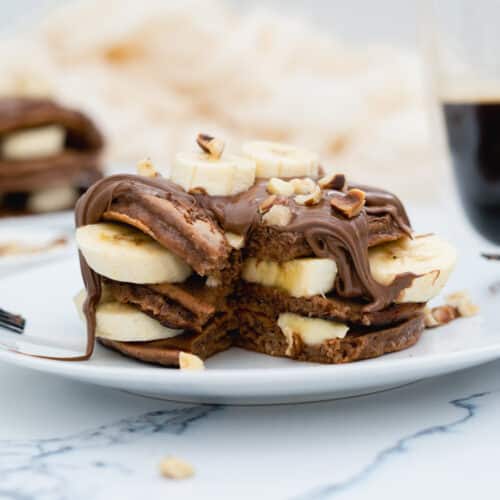 banana Nutella pancakes served on a plate