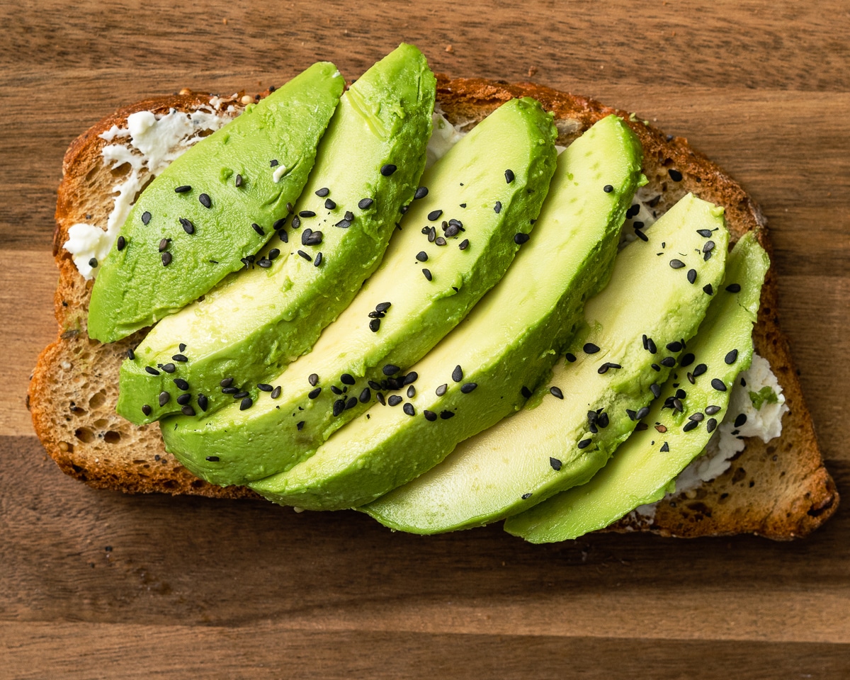 assembled avocado cream cheese toast